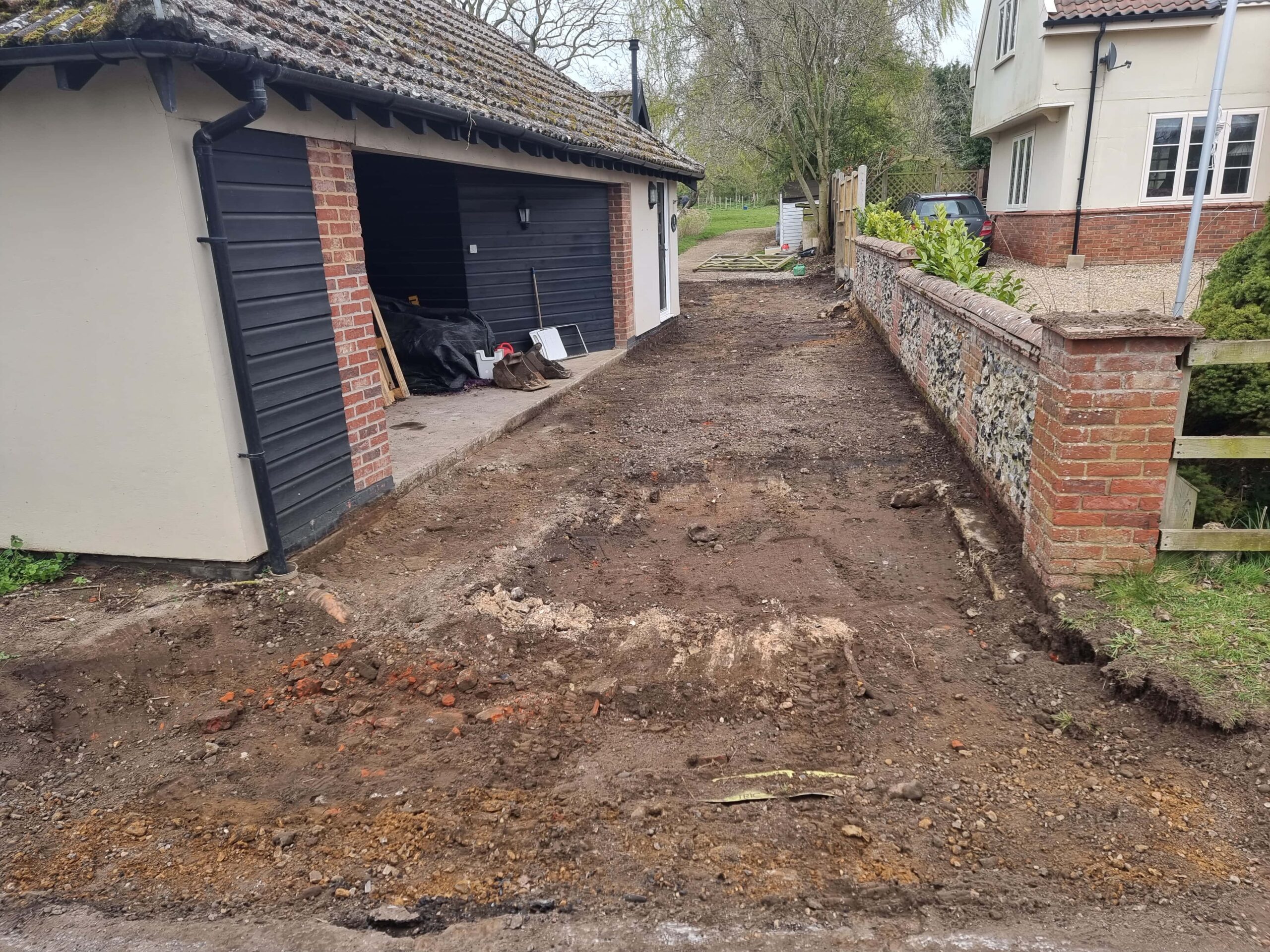 This is a tarmac driveway that is in the process of being dug out and installed by Thetford Driveway Solutions